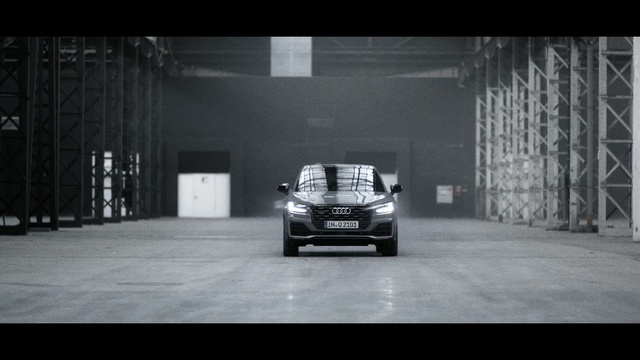 Video Reference: car, motor vehicle, land vehicle, black, vehicle, automotive design, black and white, mode of transport, photography, wheel