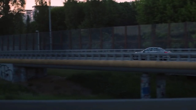 Video Reference: Mode of transport, Transport, Race track, Vehicle, Morning, Lane, Freeway, Asphalt, Road, Waterway