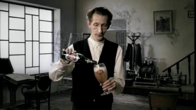 Video Reference: musical instrument, string instrument, percussion, wind instrument, suit, brass instrument, Person