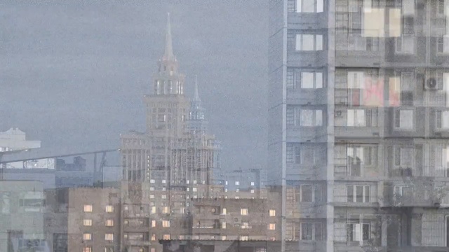 Video Reference: skyscraper, metropolis, city, building, metropolitan area, urban area, town, sky, daytime, skyline, Person