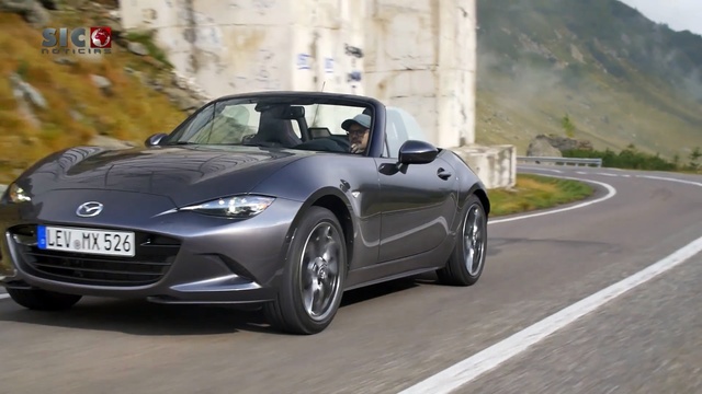 Video Reference: car, land vehicle, vehicle, personal luxury car, motor vehicle, mazda, automotive design, convertible, sports car, luxury vehicle