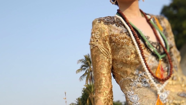 Video Reference: outerwear, formal wear, Person