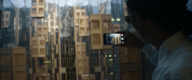 Video Reference: urban area, reflection, city, building, window, metropolis, skyscraper, sky, night, darkness, Person