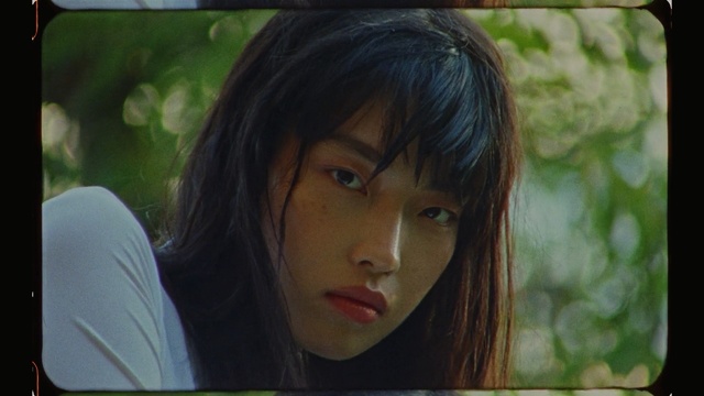 Video Reference: Hair, Face, Lip, Lady, Beauty, Green, Hairstyle, Head, Nose, Skin