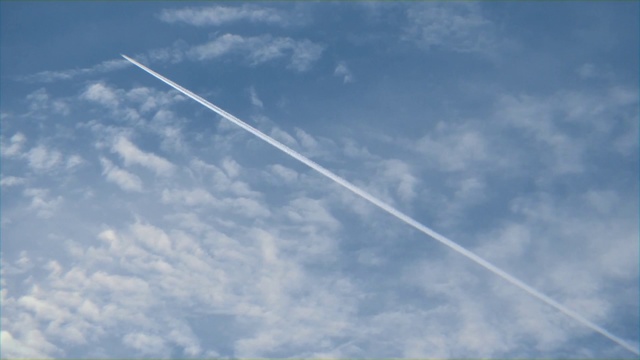 Video Reference: Sky, Daytime, Blue, Cloud, Atmosphere, Azure, Line, Cumulus, Calm, Meteorological phenomenon, Outdoor, Clouds, Airplane, Plane, Flying, Cloudy, Large, Jet, Air, Day, High, Skiing, Street, View, White, Sign, City, Water, Red, Pole, Stop, Traffic, Hill, Ocean, Snow