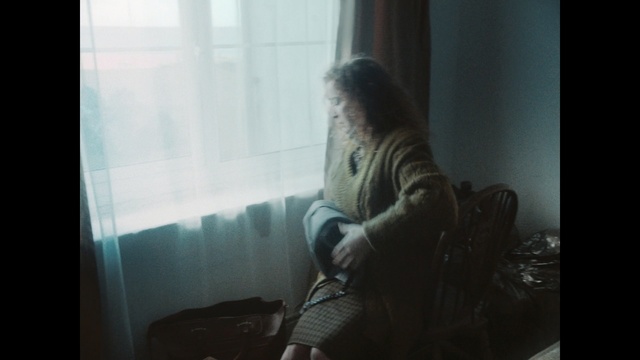 Video Reference: girl, snapshot, sitting, human, arm, darkness, screenshot, long hair, window, fun