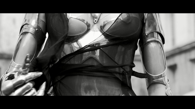 Video Reference: black, black and white, monochrome photography, black hair, monochrome, muscle, arm, eyewear, fetish model, armour