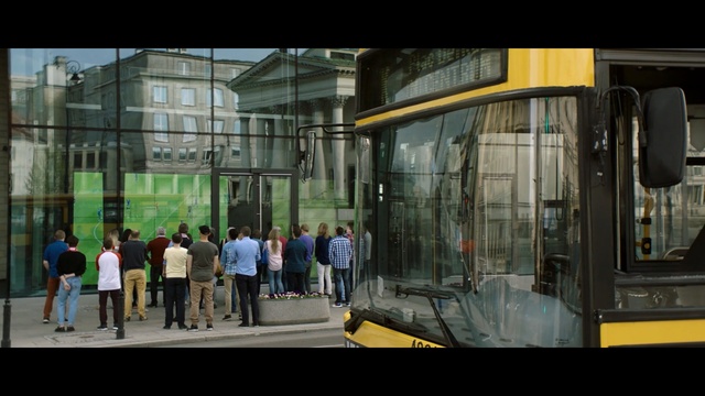 Video Reference: Metropolitan area, Urban area, Mode of transport, Snapshot, Transport, Architecture, Street, Metropolis, City, Facade, Person