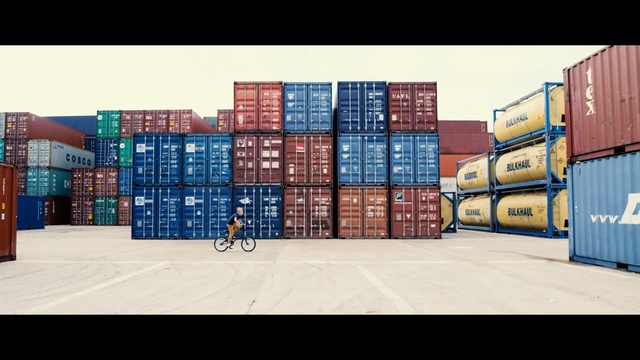 Video Reference: blue, shipping container, freight transport, facade, cargo, product, Person