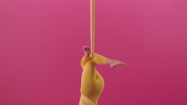 Video Reference: Pink, Aerialist, Arm, Joint, Shoulder, Performing arts, Performance, Acrobatics, Human body, Dance