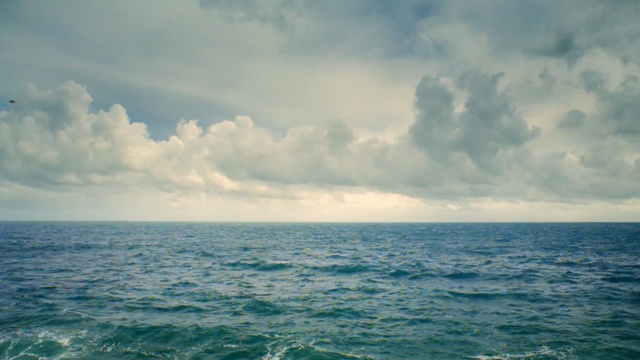 Video Reference: sea, sky, horizon, ocean, cloud, water, calm, coastal and oceanic landforms, wind wave, shore