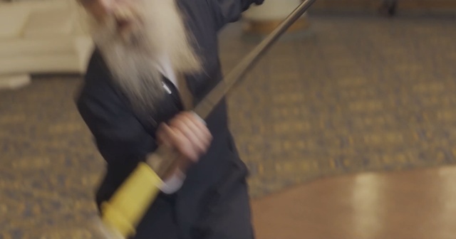 Video Reference: black, mammal, floor, flooring, wood, arm, joint, fun, hardwood, Person