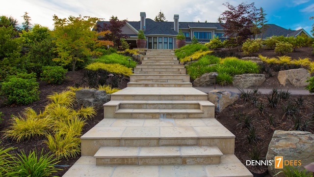 Video Reference: property, walkway, garden, real estate, landscape, estate, landscaping, outdoor structure, yard, house, Person