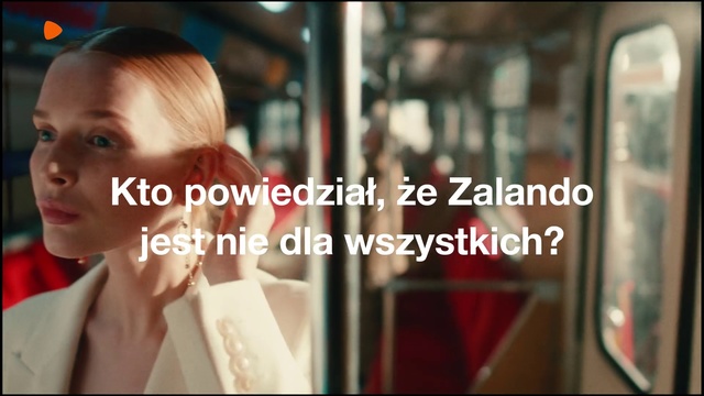Video Reference: Hair, Transport, Text, Hairstyle, Blond, Photography, Font, Photo caption, Adaptation, Passenger, Person, Indoor, Woman, Young, Sitting, Photo, Food, Red, Girl, Front, Table, Holding, Smiling, Sign, Standing, Restaurant, Glass, Pizza, White, Phone, Man, Human face, Screenshot