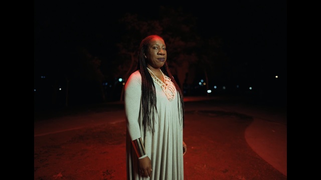 Video Reference: red, darkness, night, light, girl, midnight, fun, performance art, flash photography, Person