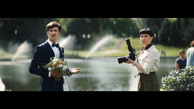 Video Reference: Photograph, Male, Wedding, Photography, Ceremony, Groom, Bride, Gentleman, Movie, Formal wear, Person, Man, Photo, Holding, Water, Standing, Woman, Different, Suit, White, People, Group, Game, Street, Wedding dress, Flower, Clothing, Sport