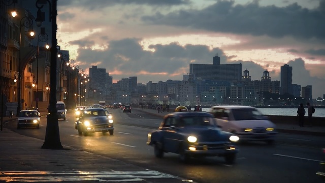 Video Reference: car, metropolitan area, urban area, cityscape, city, metropolis, sky, downtown, infrastructure, night