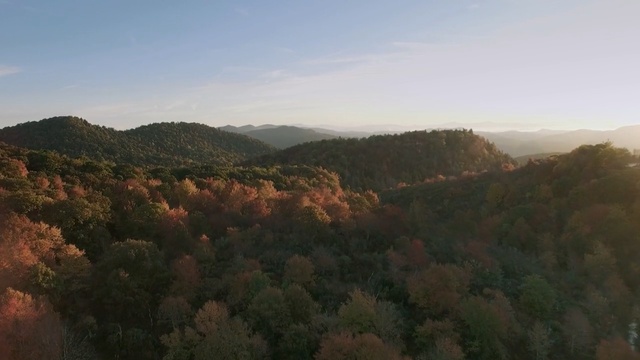Video Reference: Mountainous landforms, Nature, Sky, Vegetation, Hill, Hill station, Wilderness, Atmospheric phenomenon, Highland, Mountain