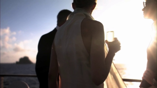 Video Reference: Backlighting, Standing, Shoulder, Photography, Outerwear, Sunlight, Hand, Neck, Temple, Shadow