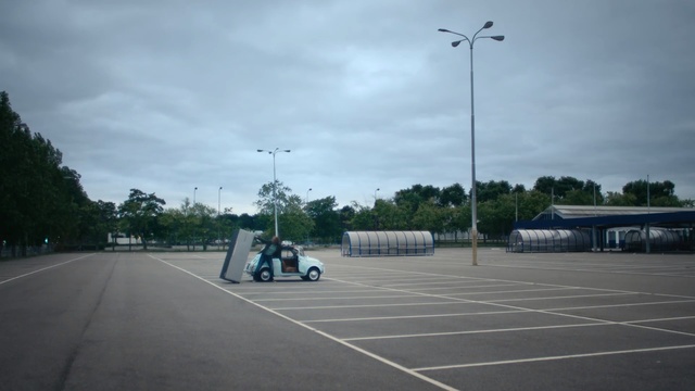 Video Reference: Asphalt, Road, Public space, Line, Infrastructure, Sky, Parking lot, Lane, Road surface, Sport venue