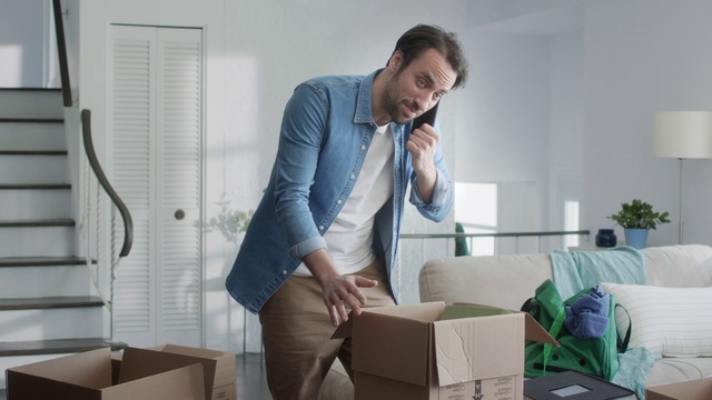 Video Reference: Furniture, Room, Sitting, Living room, Desk, Footwear, Leg, Interior design, Table, White-collar worker