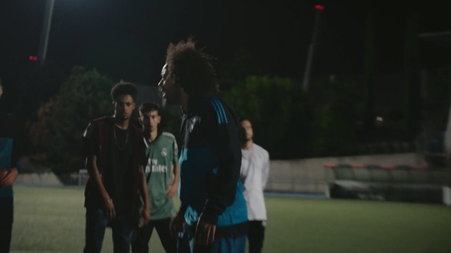 Video Reference: vertebrate, night, youth, snapshot, player, fun, crowd, darkness, competition event, performance, Person