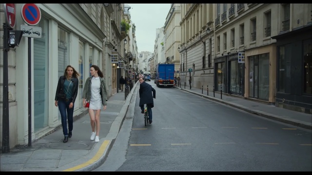 Video Reference: Street, Lane, Photograph, Road, Pedestrian, Town, Snapshot, Human settlement, Sidewalk, Urban area, Person