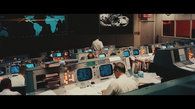 Video Reference: Electronics, Design, Room, Photography, Electronic device, Space, Indoor, Computer, Table, Desk, Sitting, Monitor, Laptop, Man, Office, White, Screen, Television, Woman, Keyboard, Large, Holding, Video, People, Desktop, Playing, Standing, Game, Kitchen, Text, Person, Clothing, Computer monitor, Display, Cluttered