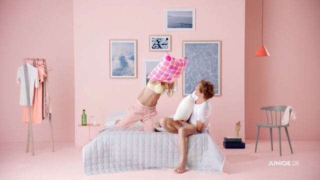 Video Reference: Pink, Furniture, Room, Bedroom, Bed, Interior design, Bed sheet, Bed frame, Sitting, Plant