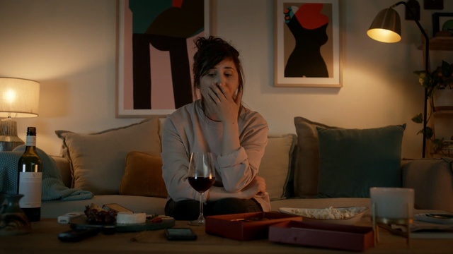 Video Reference: Room, Lighting, Lamp, Lighting accessory, Fun, Textile, Interior design, Lampshade, Sitting, Linens, Person
