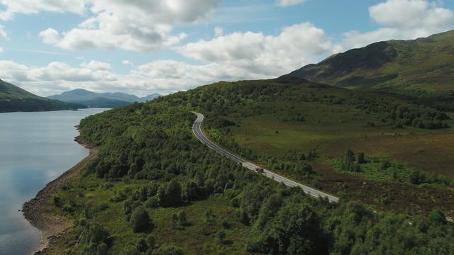Video Reference: highland, nature reserve, loch, hill, road, sky, reservoir, hill station, river, mountain