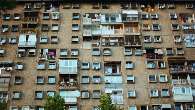 Video Reference: neighbourhood, residential area, urban area, building, tower block, architecture, apartment, city, suburb, metropolis, Person