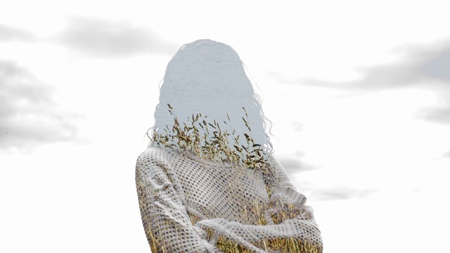 Video Reference: White, Outerwear, Beige, Textile, Photography, Plant, Fashion accessory, Wool, Shoe, Trousers, Person, Snow, Outdoor, Man, Looking, Holding, Covered, Standing, Wearing, Cross, Woman, Skiing, Field, Horse, Fashion