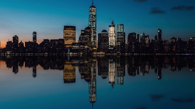 Video Reference: Reflection, Cityscape, City, Skyline, Metropolitan area, Sky, Urban area, Skyscraper, Blue, Human settlement