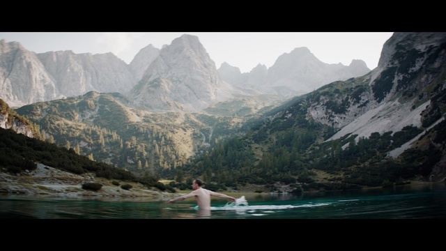 Video Reference: Mountainous landforms, Mountain, Body of water, Nature, Highland, Mountain range, Water, Fjord, Wilderness, Lake