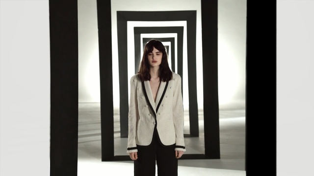 Video Reference: formal wear, outerwear, fashion, shoulder, gentleman, suit, blazer, fashion design, clothes hanger, photo shoot, Person