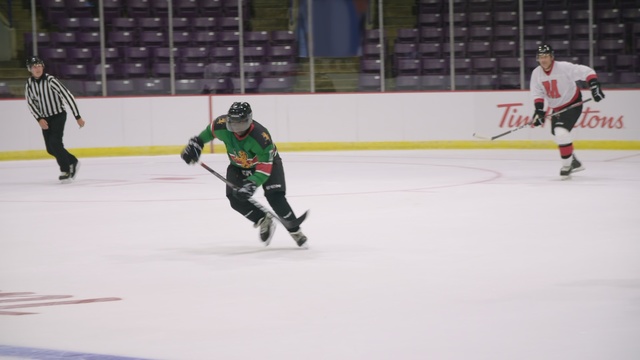Video Reference: Sports, Hockey protective equipment, Ice hockey position, Team sport, Hockey, Ice rink, Ice hockey, Player, College ice hockey, Tournament, Person