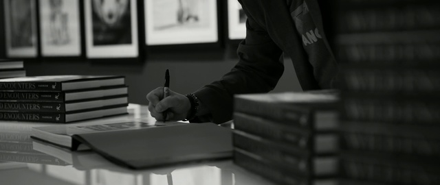 Video Reference: Photograph, White, Black, Standing, Black-and-white, Snapshot, Table, Sitting, Photography, Monochrome photography