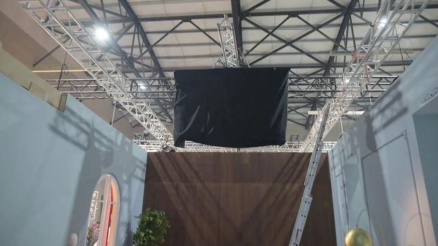 Video Reference: Stage, Architecture, Ceiling, Technology, Sport venue, Stadium, Electronic device, Building, Metal