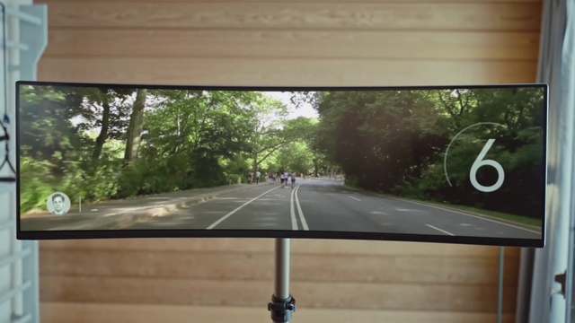 Video Reference: Tree, Road, Asphalt, Auto part, Line, Room, Road surface, Window, House, Architecture, Building, Front, Sitting, Wooden, Table, White, Bench, Door, Black, Living, Large, Man, Standing, Woman, People, Kitchen, Sign, Text, Car, Vehicle
