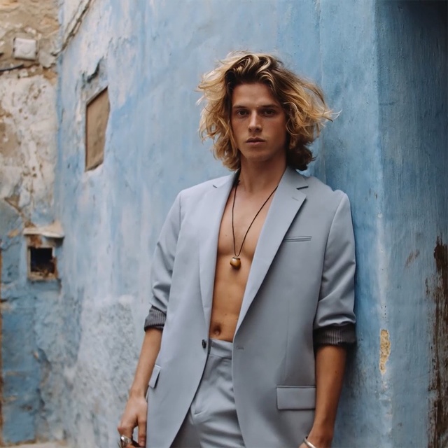 Video Reference: Clothing, Suit, Outerwear, Fashion, Blazer, Formal wear, Street fashion, Pantsuit, Jacket, Photo shoot, Person