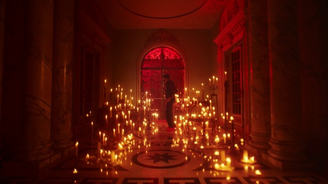 Video Reference: Red, Lighting, Light, Architecture, Night, Symmetry, Light fixture, Arch, Building, Darkness, Outdoor, Street, Sign, Lit, Traffic, Table, City, Standing, People, Candle