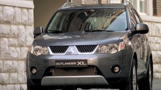 Video Reference: car, land vehicle, vehicle, motor vehicle, mitsubishi, sport utility vehicle, bumper, mid size car, automotive design, vehicle registration plate