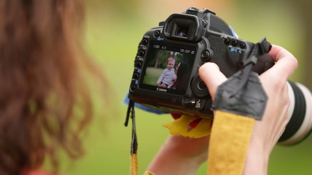 Video Reference: single lens reflex camera, cameras & optics, camera, camera operator, photography, digital slr, reflex camera, camera lens, digital camera, photographer