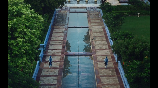 Video Reference: Property, Wall, Architecture, Building, Roof, Facade, Walkway, Real estate, Residential area, Estate