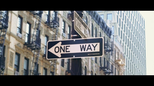 Video Reference: landmark, street sign, urban area, building, metropolitan area, advertising, town, metropolis, city, signage