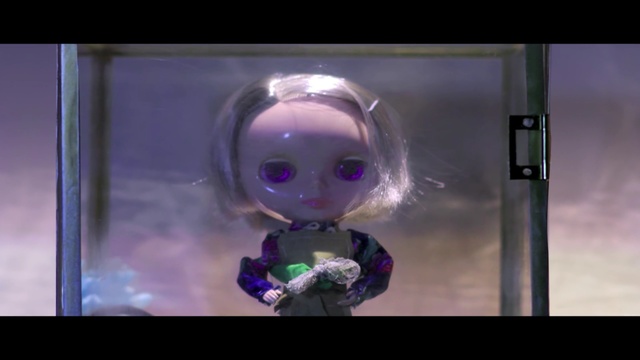 Video Reference: purple, doll, violet, screenshot, figurine, toy, mouth, space, computer wallpaper, action figure