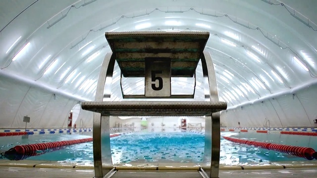 Video Reference: sport venue, structure, leisure centre, leisure, swimming pool, ceiling, daylighting, recreation, roof