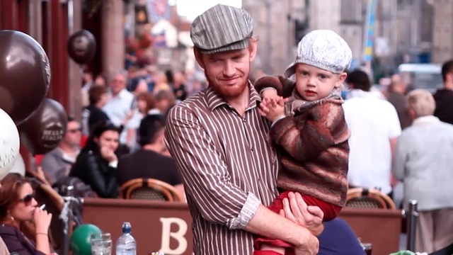 Video Reference: crowd, product, event, interaction, street, recreation, Person