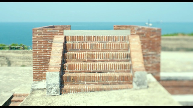 Video Reference: Brick, Brickwork, Wall, Land lot, Bricklayer, Architecture, Historic site, Building, Person
